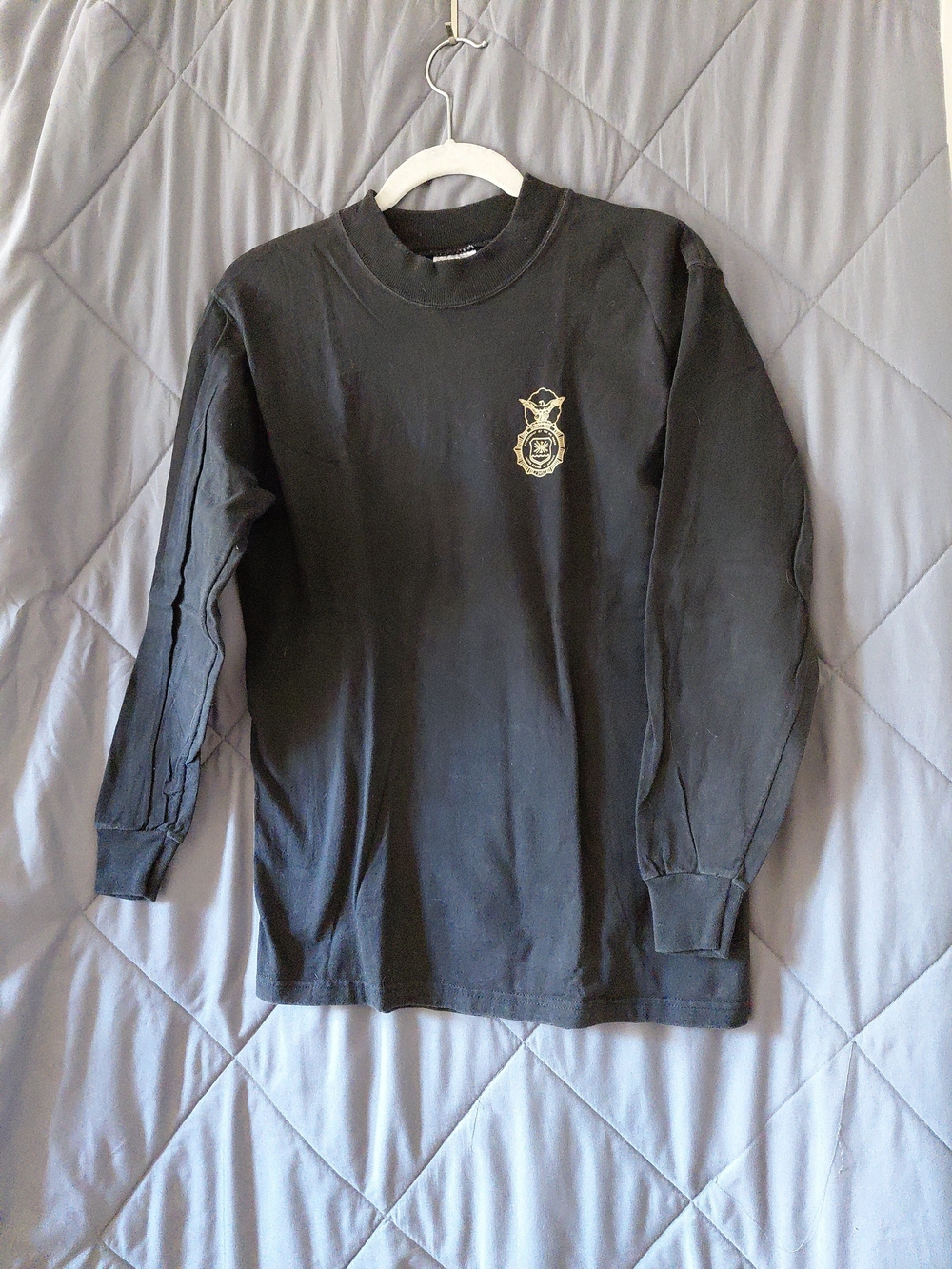 Black Long-Sleeve Crewneck Shirt with Gold Crest Detail